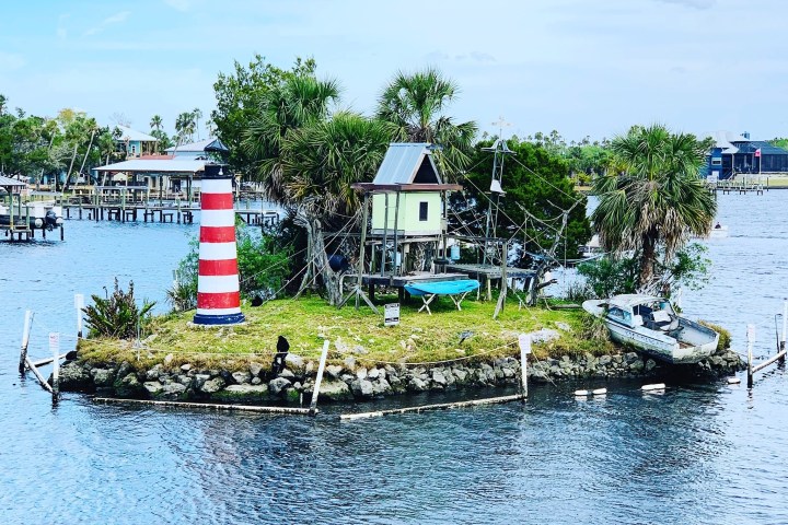 a small boat in a body of water